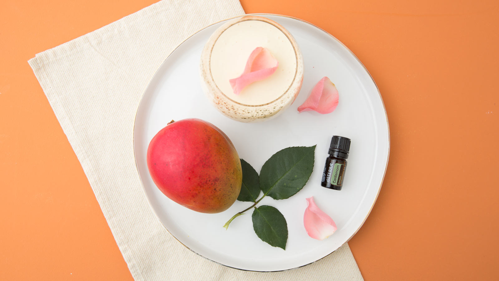 https://www.doterra.com/medias/16x9-1600x900-mango-lassi-new-us-en-web.jpg?context=bWFzdGVyfGltYWdlc3wxNTEwNDR8aW1hZ2UvanBlZ3xpbWFnZXMvaDA3L2g2MC85MTQ4NTQxNzYzNjE0LmpwZ3wxOTViNzBjNGY5YTY1MGUyMWU1NjNiM2JlNTdjNmZmNTFjM2Q5ZjI0NDRiODQ4MjAzNWY4OWQxYzVlZTFjNTA5